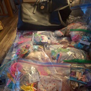 Hundreds of Barbie Clothes, Accessories, and a Tote Bag